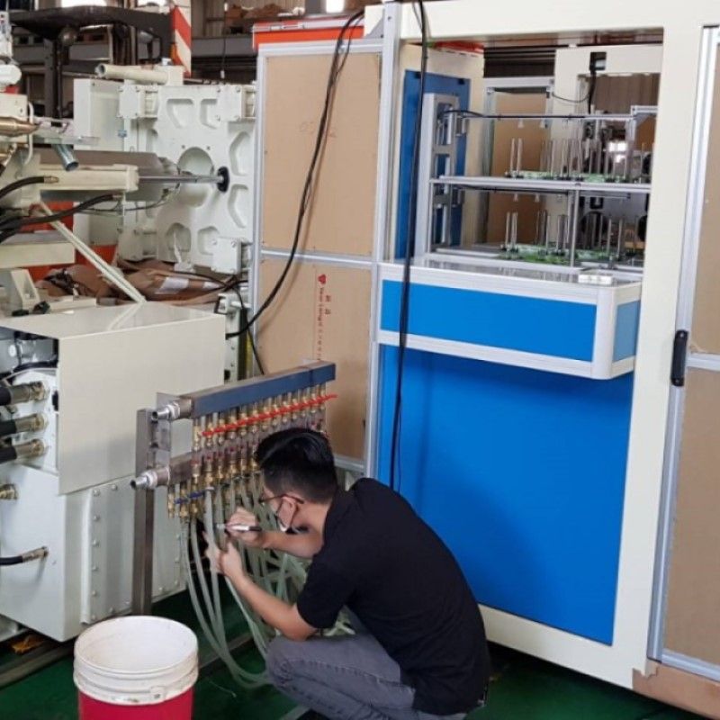 Top Unite integrates the professional IML machine and mold into our plastic injection molding machine.